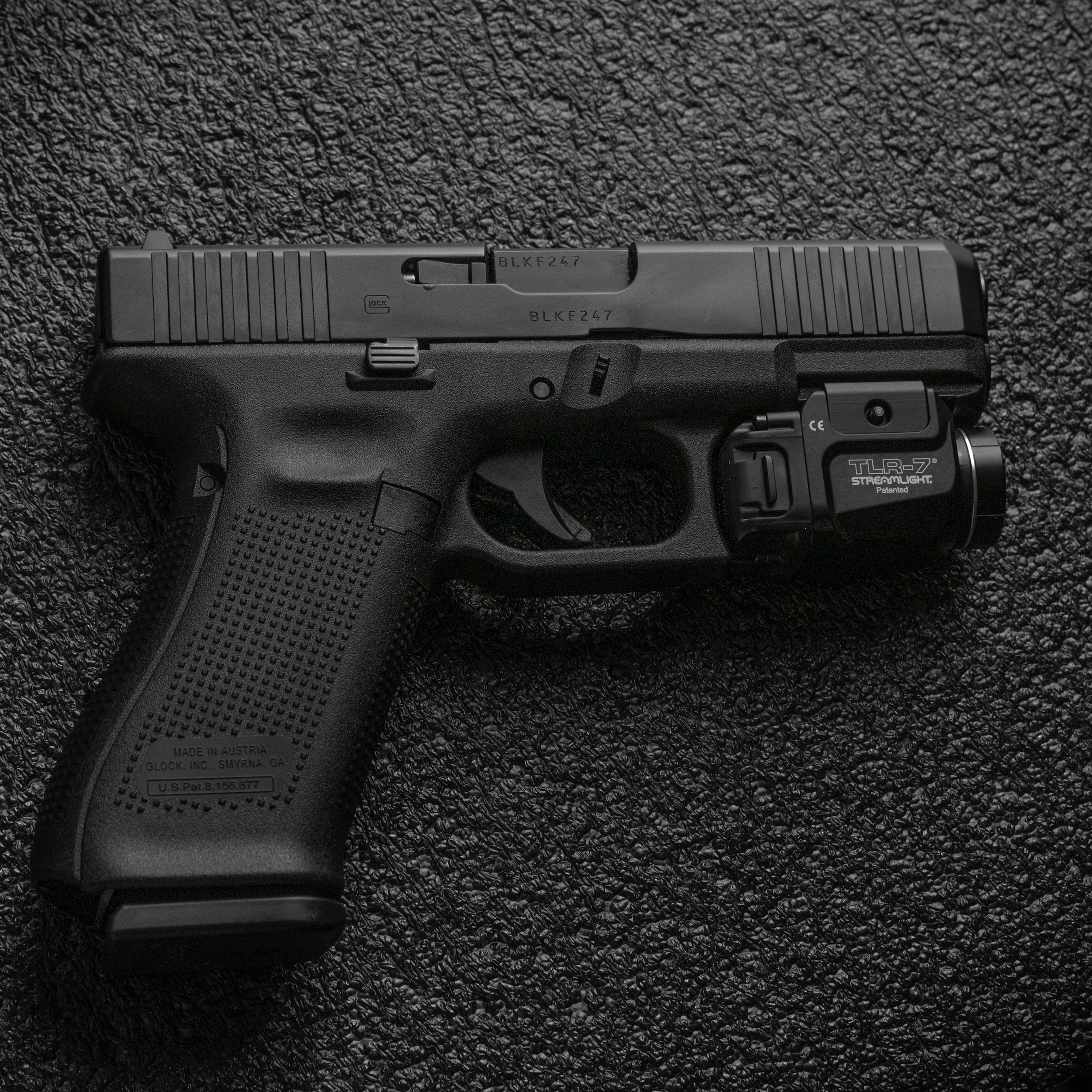 Pistol on textured background